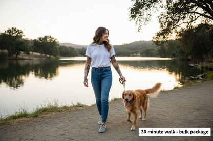 girl with tattoos brown hair white trshirt not ripped jeans checkerd vans walking dog by atascadero lake with text in bottom right corner 30 minute walk-bulk package 